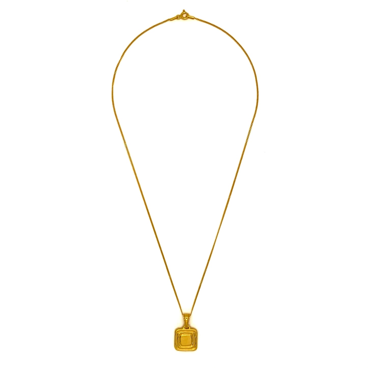 Necklace with geometric pendant on curb chain