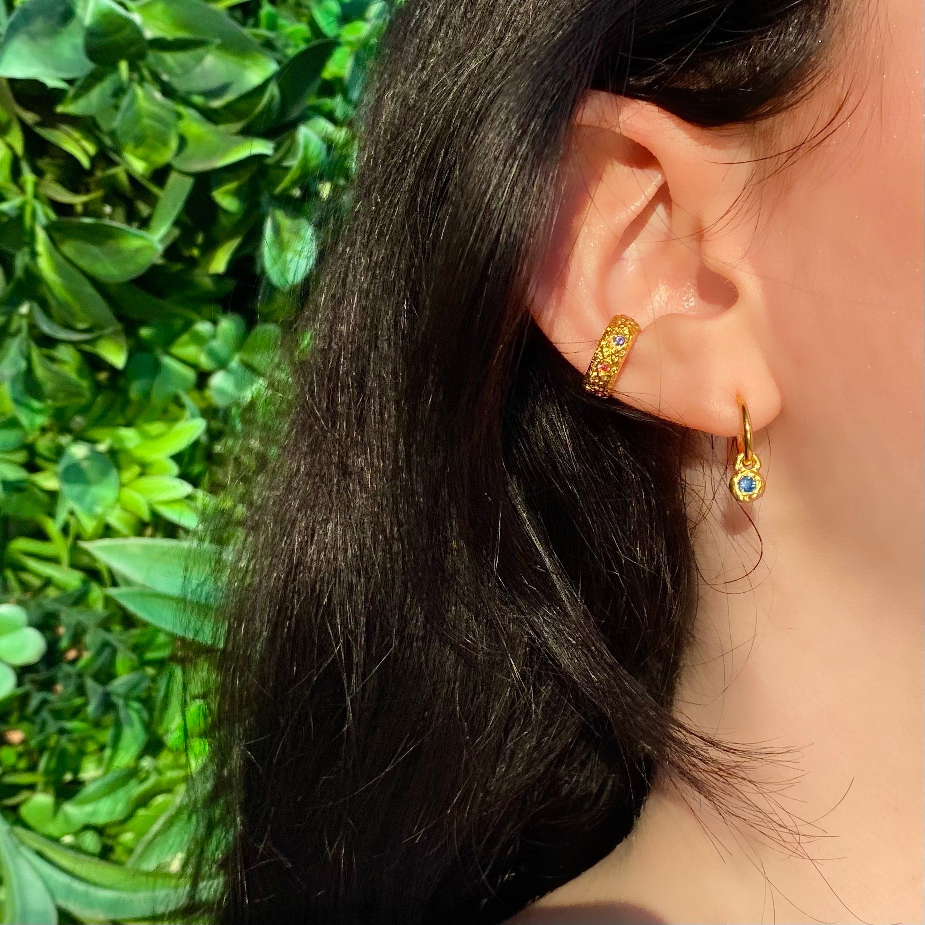 Thick gold earcuff with rainbow sapphires