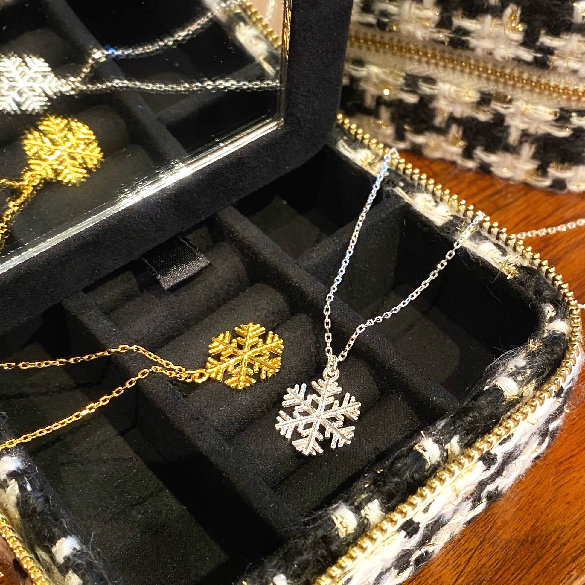 Dainty snowflake pendant necklaces on delicate chain in sterling silver and gold plated