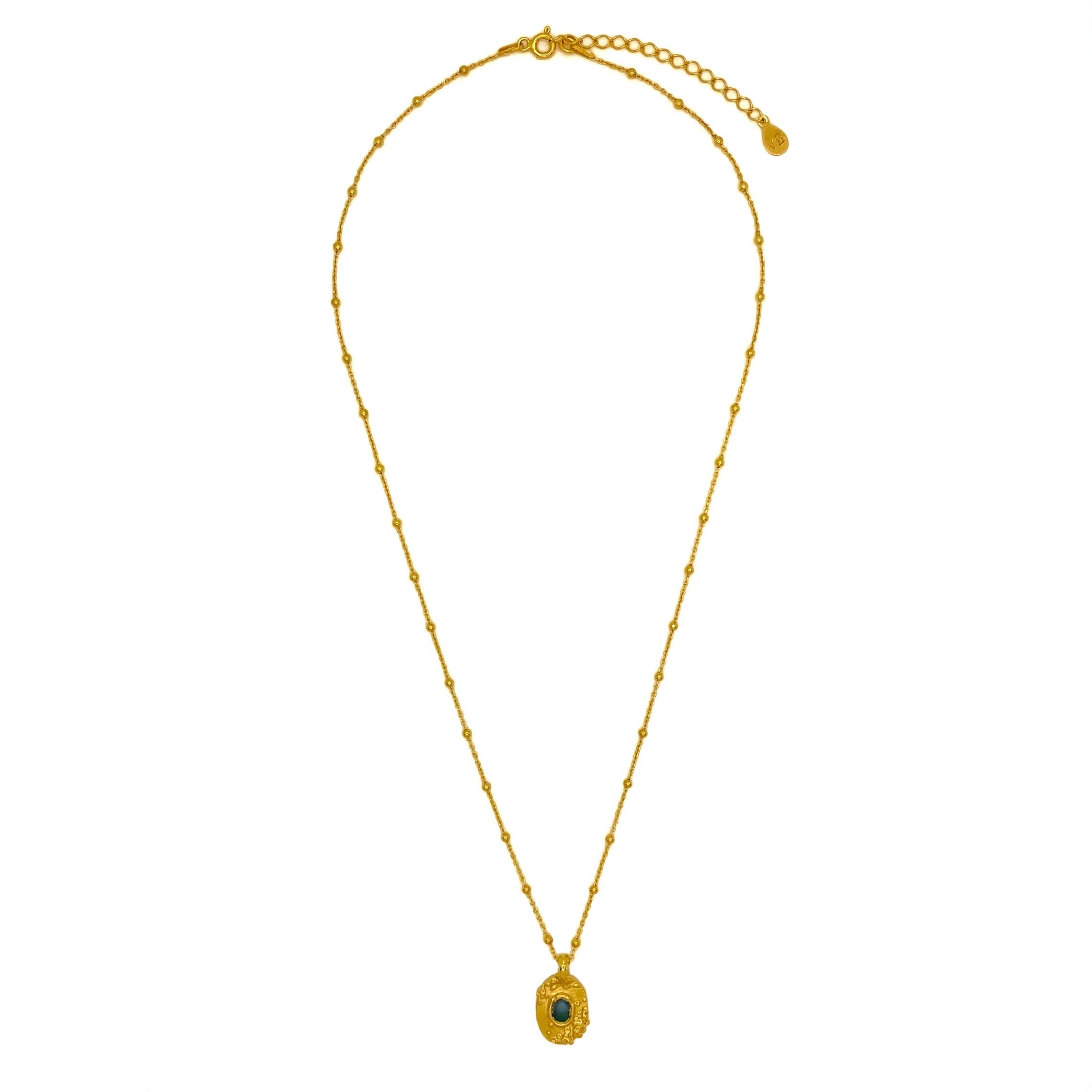 Sapphire pendant on gold satellite chain