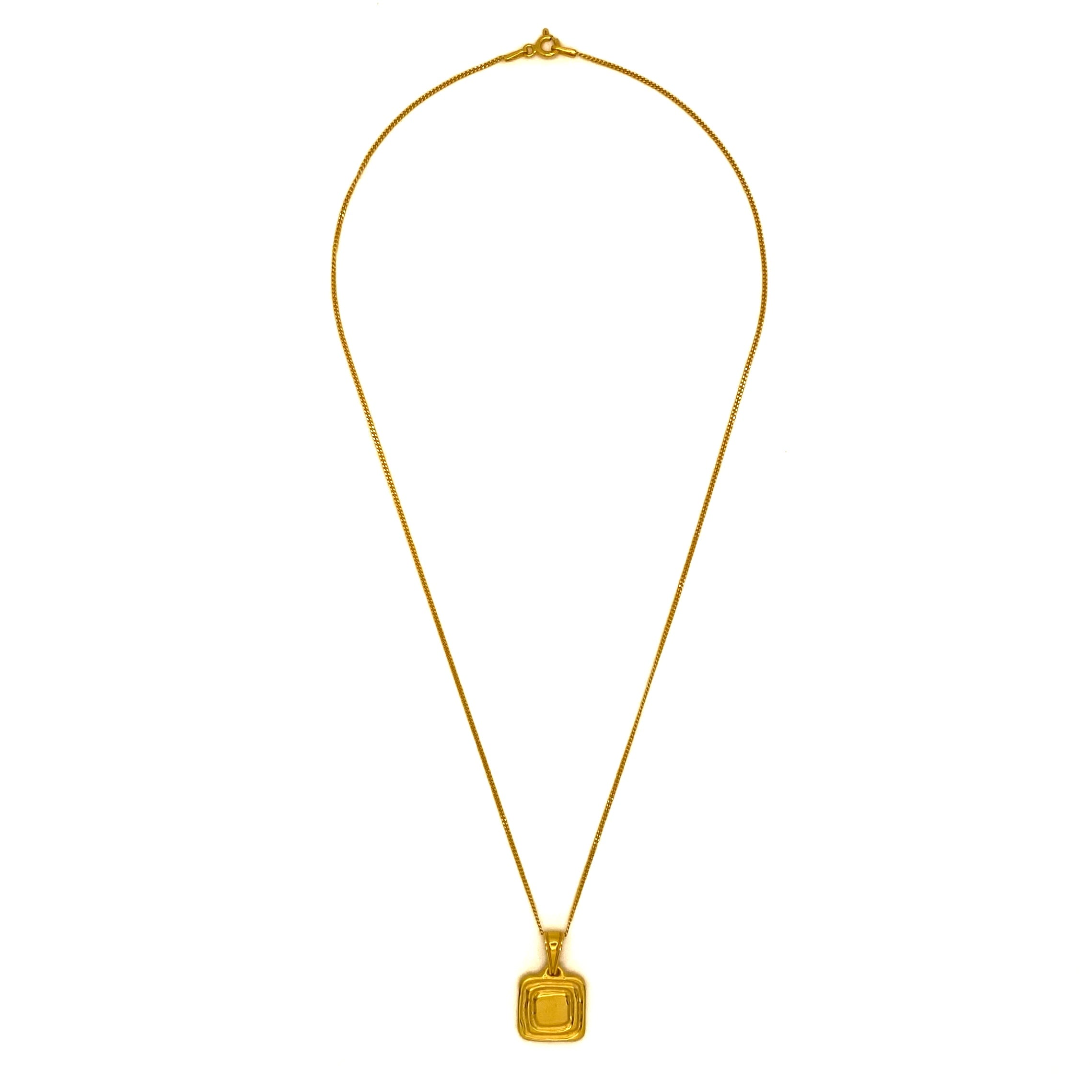 Necklace with geometric pendant on curb chain