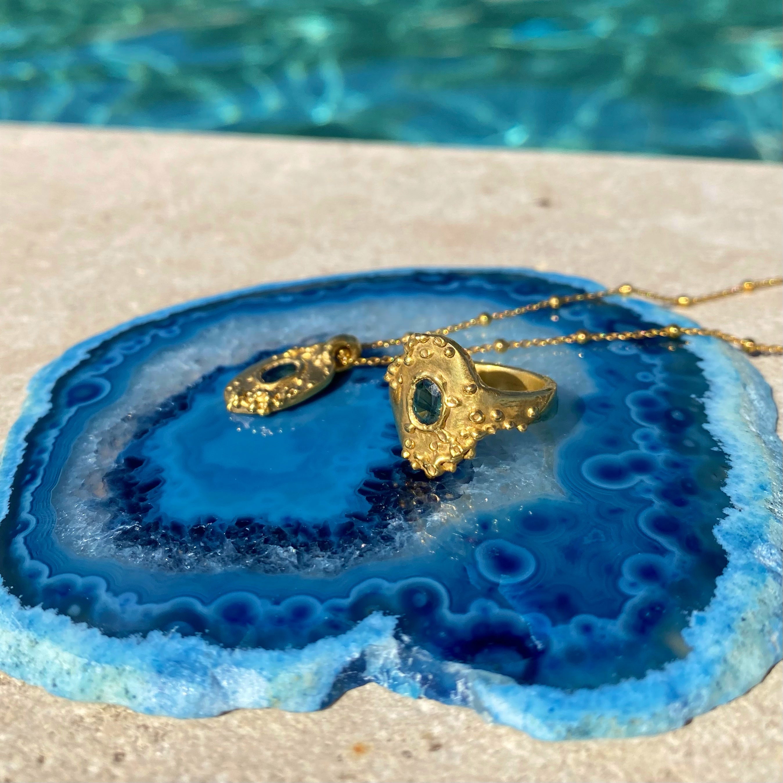 Sunken treasure signet ring and necklace with blue sapphires