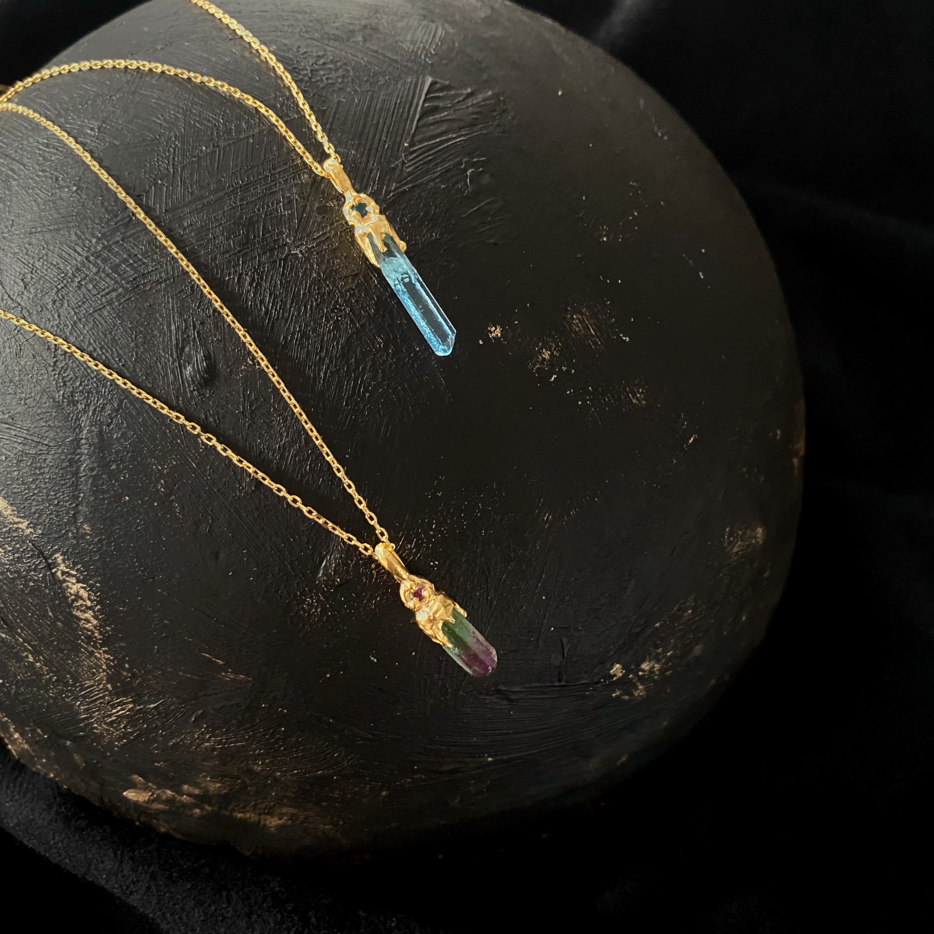 Raw aquamarine and tourmaline crystal necklaces 