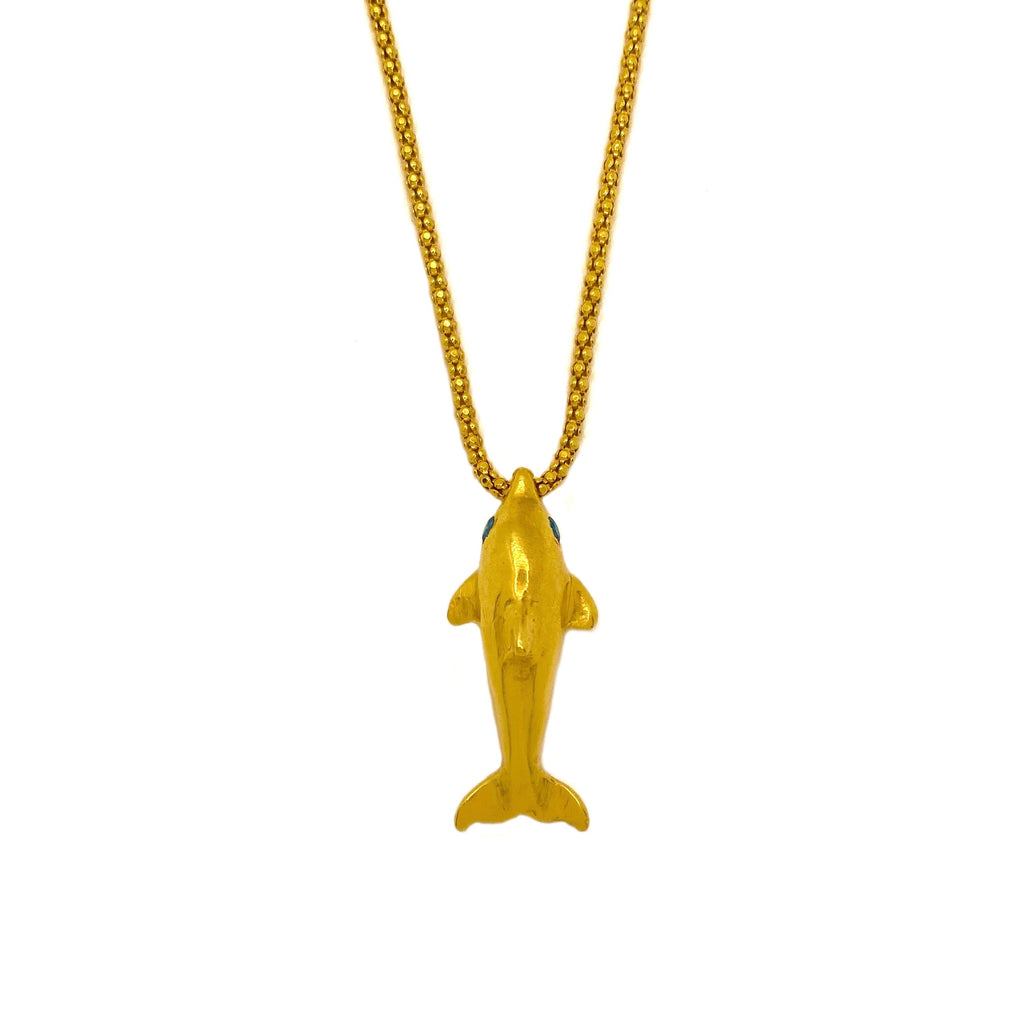 Gold dolphin pendant with blue sapphire 